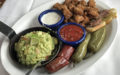 Taste of the West: Rocky Mountain oysters, bison tongue, peanut butter filled jalapenos, bison sausage, guacamole.