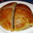 A giant quartered knish is filled with kasha (cereal)