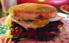 Lean bacon and runny egg sandwiched in a toasted English muffin