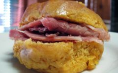 Orange sweet potato biscuit holds salty pink country ham