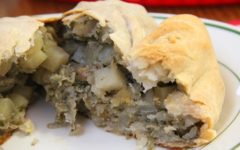 Opened pasty shows moist beef, potatoes, rutabagas