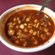 Hominy corn & peppers make posole a spicy bowl of food.