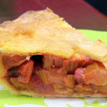 Double-crust pie with soft-chunk sweetened rhubarb inside