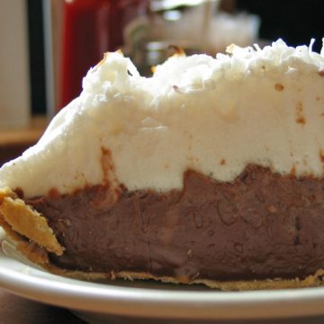 Fragile crust supports a light chocolate cream pie topped with meringue.
