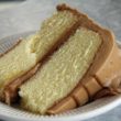 Tender 2-layer yellow cake boasts butter-sweet caramel-colored frostingy