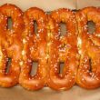 Four soft pretzels, hot from the oven