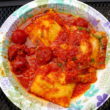 Ravioli with rich tomato sauce
