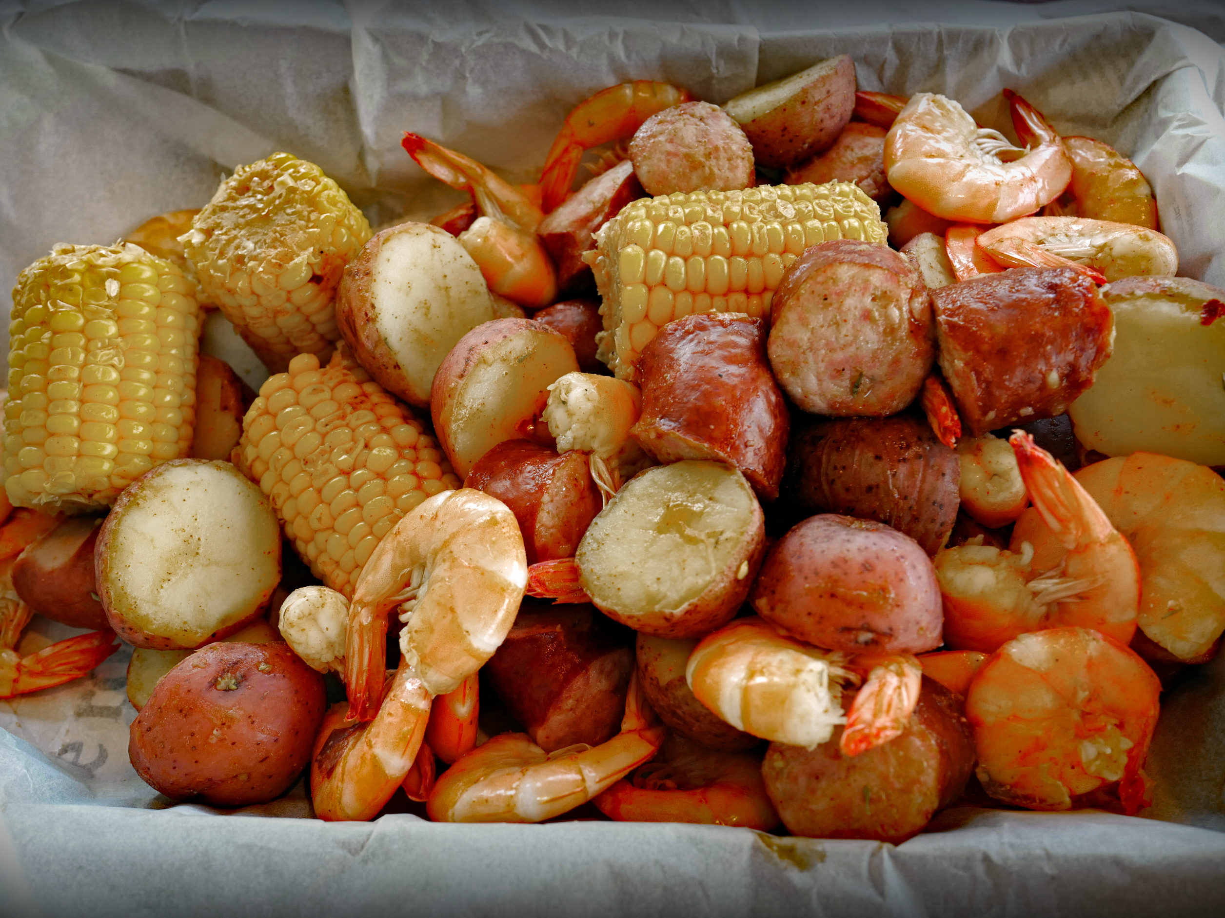 Spicy shrimp, corn, potatoes and sausage all heaped together
