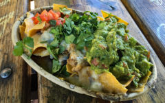 Nachos topped with all of the fixings from Rancho Bravo Tacos