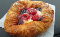 Single-serving, flaky-crust pastry encloses a colorful array of fresh berries