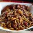 Bowl of red beans and rice also includes pieces of andouille sausage.