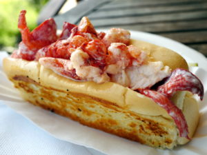 Grilled split-top bun overflows with lobster meat ... Maine lobster roll