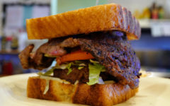 "Dam sandwich": Ribeye steak shares space with a burger and cheese in this foot-tall sandwich