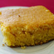 Bright yellow cornbread is moist like cake, dotted with corn kernels