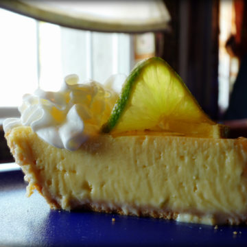 Silk smooth, pale yellow filling sits upon a crumbly Graham cracker crust