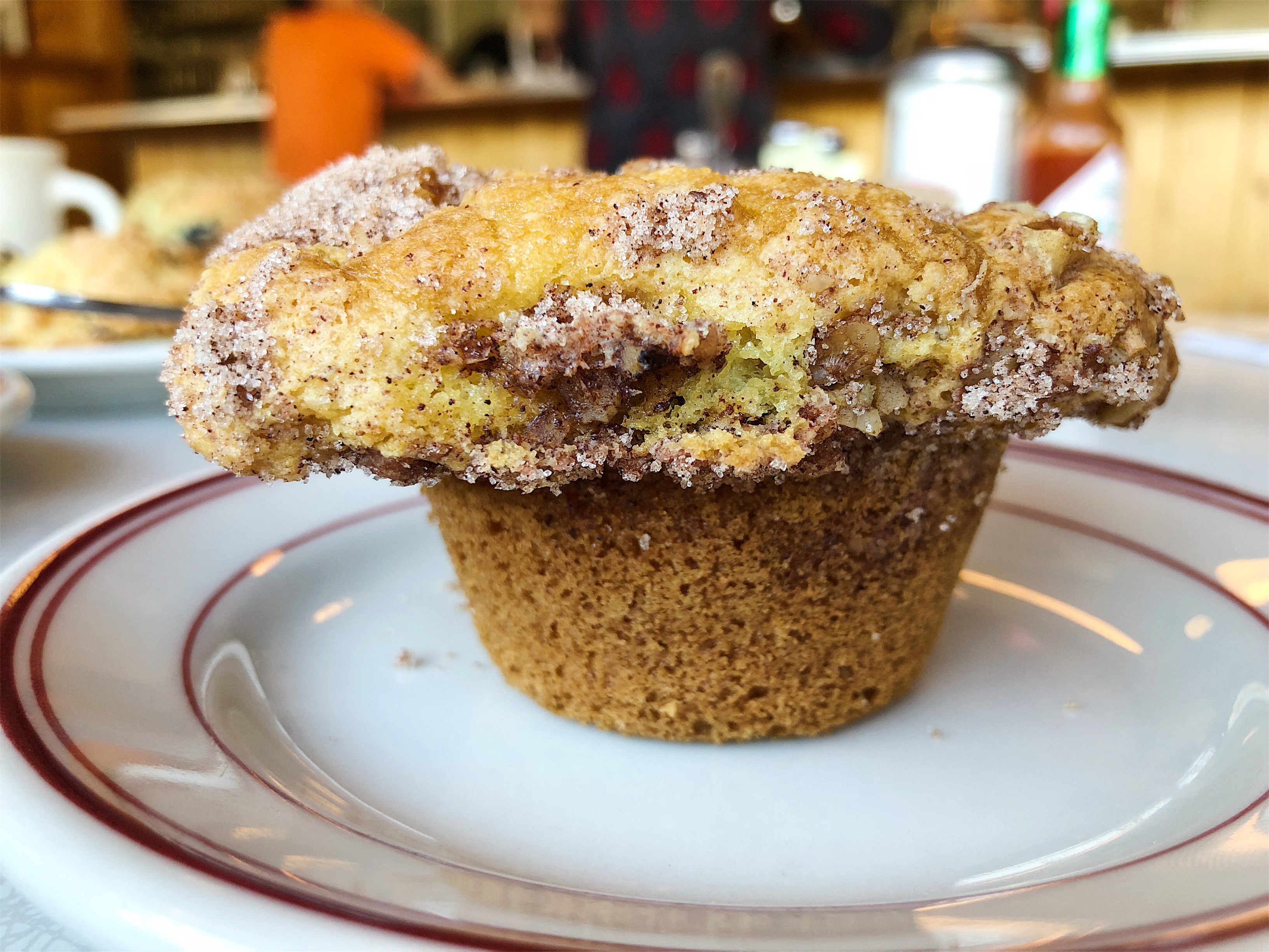 Broad-topped muffin is veined with streaks of cinnamon sugar