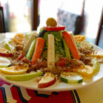Tall Mexican topopo salad features plenty of carne seca.