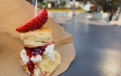 Mini scone filled with jam and whipped cream