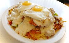 Chicken-fried steak topped with sausage gravy and sunnyside-up eggs ... excellent breakfast