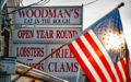 Woodman's sign & the American flag