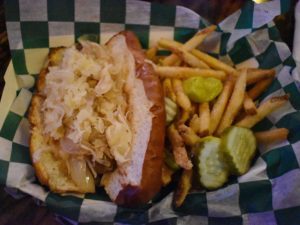 Bratwurst and a side of fries at Milwaukee Brat House