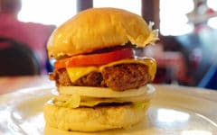 Tall, fully-dressed cheeseburger ... best square meals and burgers