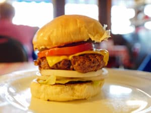 Tall, fully-dressed cheeseburger ... best square meals and burgers