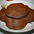 Thick buckwheat pancakes are dark brown