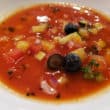 Tomato-red gazpacho soup adds blueberry for fruity sweetness.