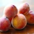 Pile of just-picked, summer-ripe peaches